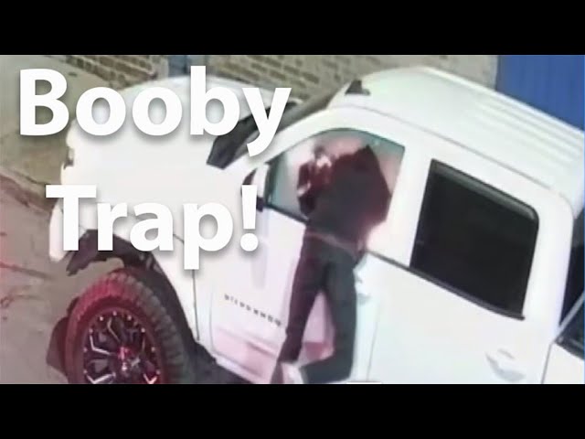 Caught on camera:  Booby trap scares off car burglar