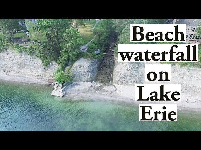 Beach waterfall flows into Lake Erie