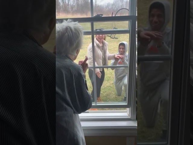 Man proposes outside window