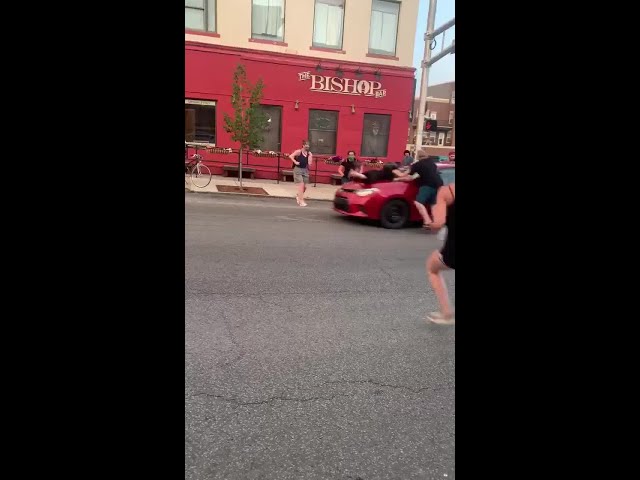 Bloomington protester struck by vehicle (Video By Rodney C. Root)