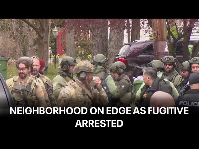 Fugitive arrested after more than 24-hour standoff