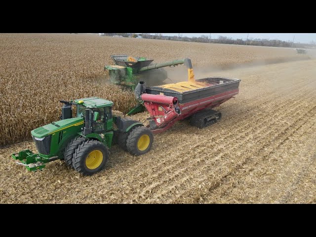 Two John Deere X9 1100 Combines with 16 Row Corn heads Harvesting a 640 Acre Field in Illinois