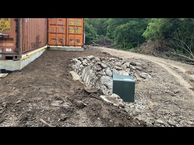 Retaining wall I built myself with totally free materials behind my shipping container house