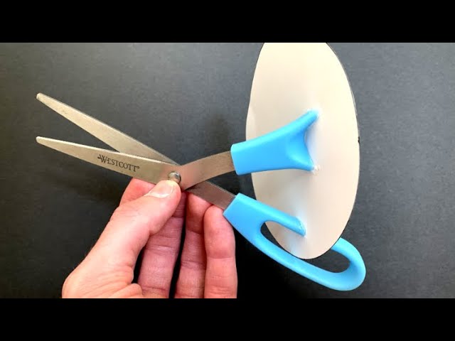Cutting Scissors With Paper