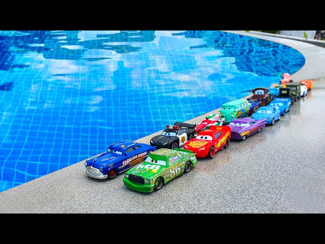 Disney Pixar Cars falling into deep pool: Lightning McQueen, Tow Mater, Sally Carrera, Francesco