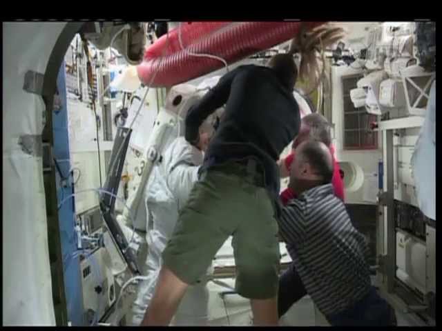 Spacewalk aborted after astronaut helmet water leak