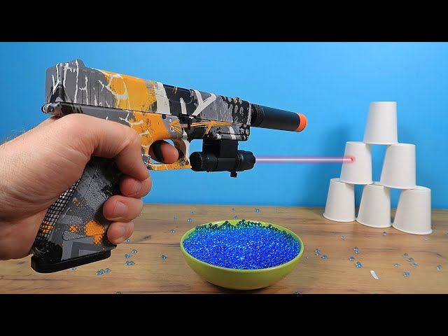 Automatic crystal bullet gun with a laser sight from Aliexpress!