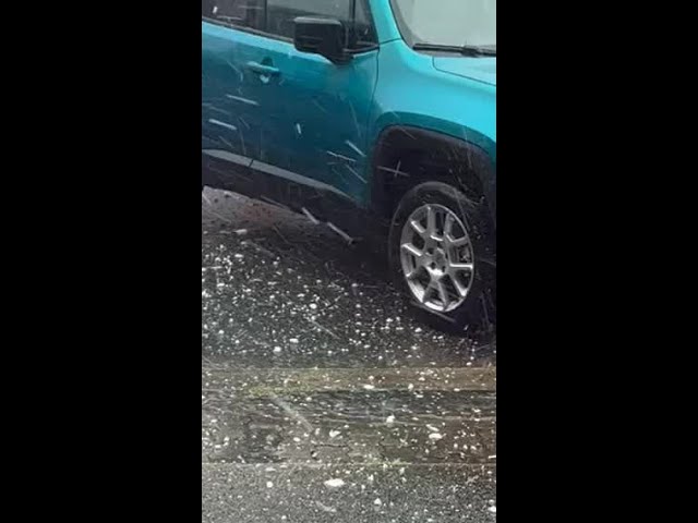 STRONG HAIL: Video from Vevay, Indiana shows massive hail striking parked cars