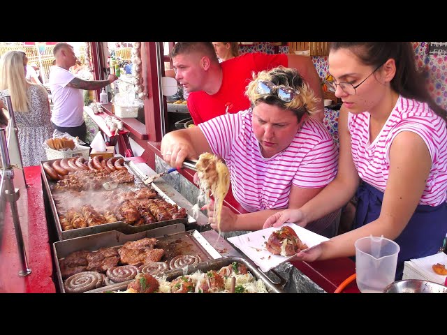 Street Food in Gdansk, Poland. Sausages, Grilled Meat, Pork Steaks, Wrap, Langos, Kurtos, Pizza