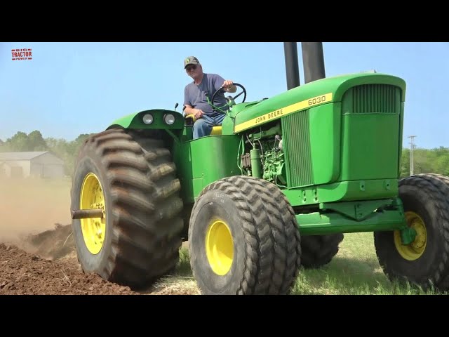 Big Tractors Plowing