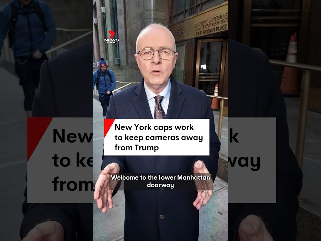 New York cops work to keep cameras away from Trump