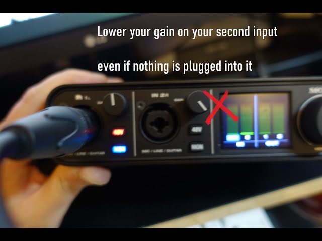 Lower your gain on your second input even if nothing is plugged into it
