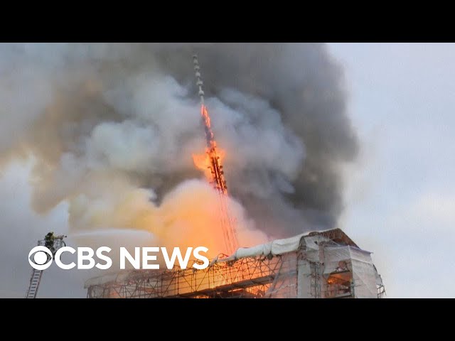 Copenhagen's historic Old Stock Exchange erupts in flames, collapsing legendary spire