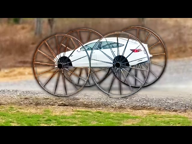 He Put Giant Wheels on His Tesla