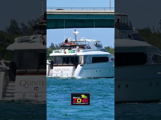 Yacht is cautious when passing under Haulover bridge