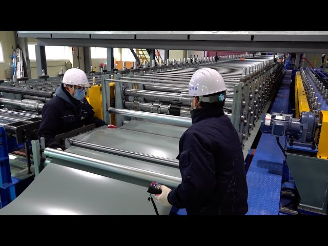 Process of Mass Production Sandwich Panels. Building Materials Factory in Korea