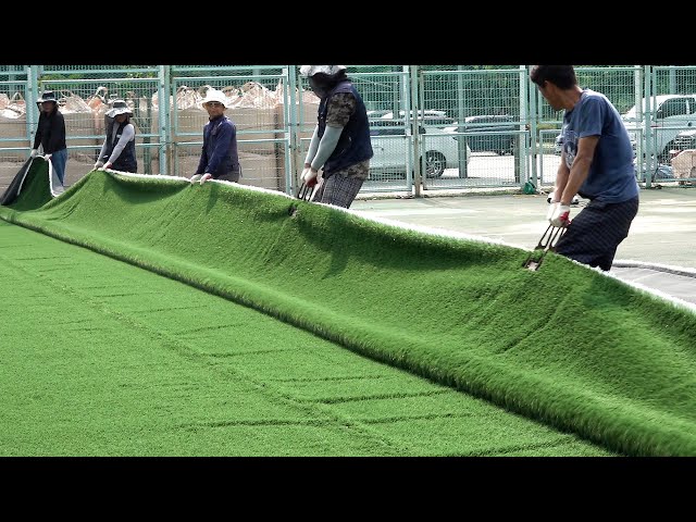 Process of making and installing artificial turf on the bare ground. Korean fake grass factory