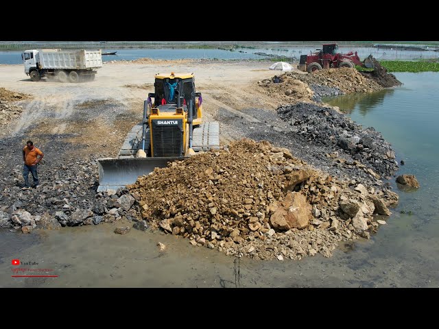 Unexpected​ Huge Dam Puddle Filling-PowerTeam Dozer Push Rocks & Truck Dump Rocks_Jobs​ Development​