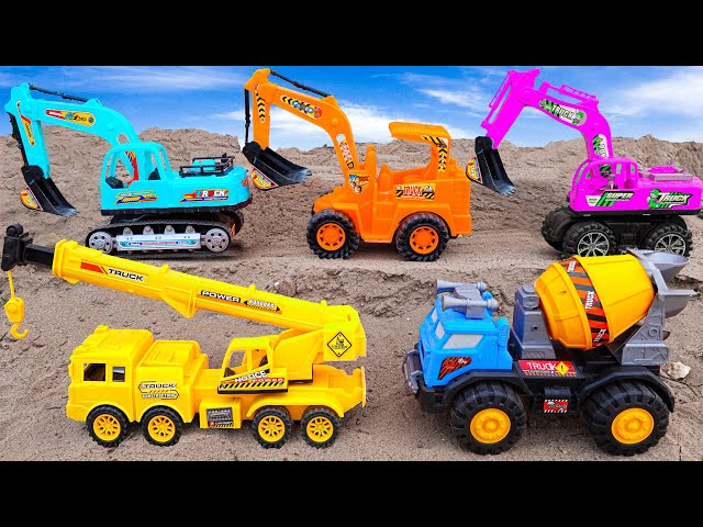 Cranes, excavators rescue dump trucks carrying sand and building roads