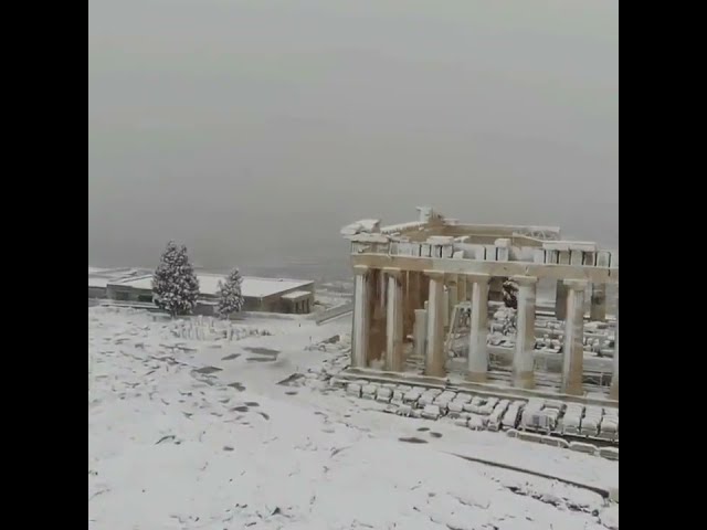 Acropolis in Athens covered by snow.
