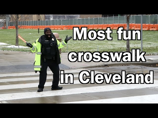 Singing and dancing at the crosswalk with Corporal Eric Hudson