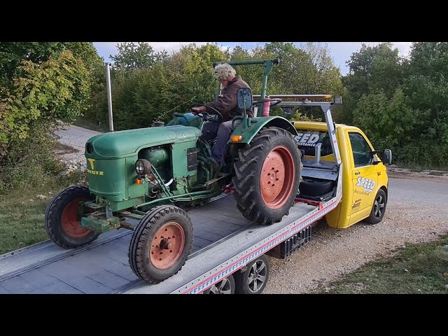 Mika utovario Ljubičin traktor na Lončarov kamion