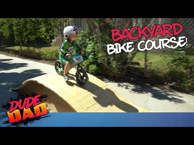 Toddler slays epic backyard bike course!