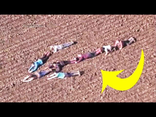 Kids Lie In Field And Refuse To Move, One Look Sends Cops Running.