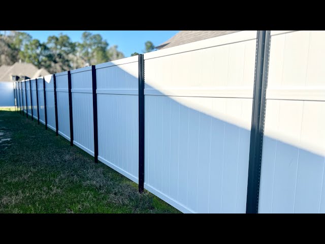 Custom White Vinyl Fence + Steel Post