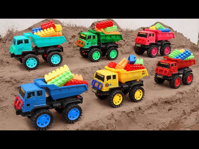 Rescue crane cars, excavators, dump trucks to build lego bridges