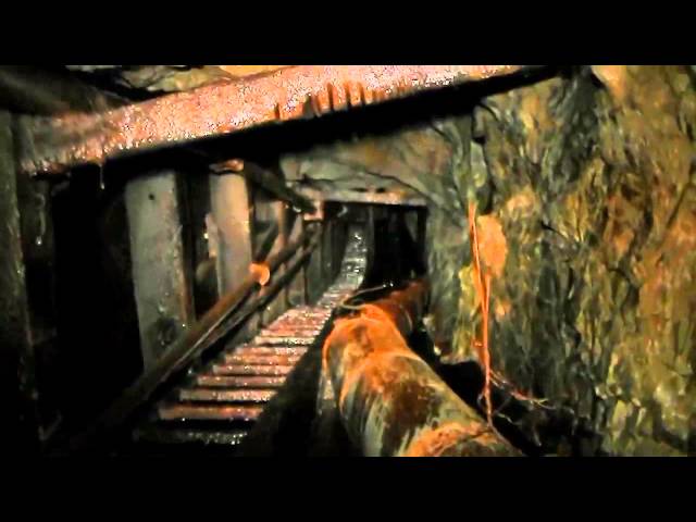 Flooded Abandoned Mine Tunnel With Waterfall Raise