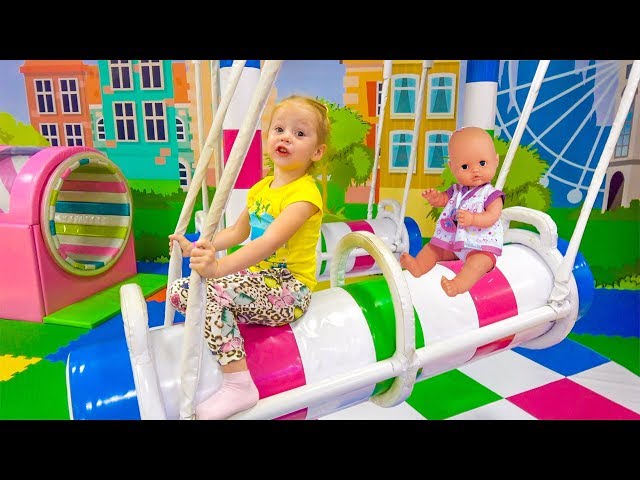 Stacy at new Indoor Playground with baby doll