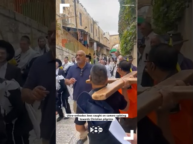 Ultra-orthodox Jews spit towards Christian pilgrims leaving Church of the Flagellation