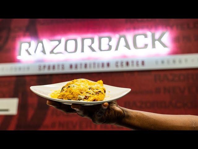What it Takes to FEED the ARKANSAS RAZORBACKS | AthlEATS