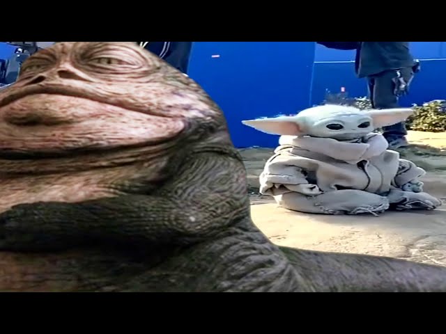 Baby Yoda dances with Jabba the Hutt