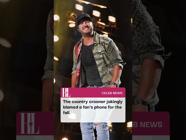 Luke Bryan took a tumble on stage and jokingly blamed a fan's phone for the fall.