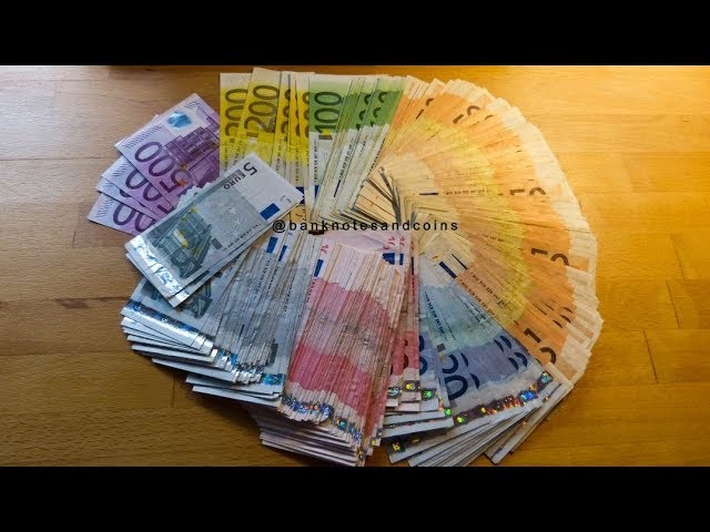 Counting Stack of old EURO banknotes
