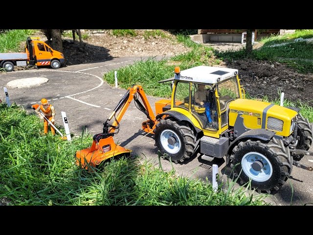 Mowing road side and hill, RC Tractor Rigitrac SKH120 Mulag Mower.