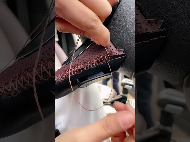 Hand sewed steering wheel holster