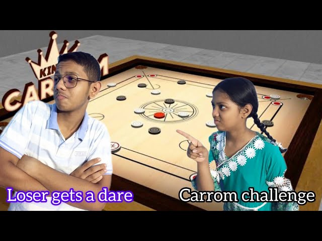 I challenged my sister for a carrom match.