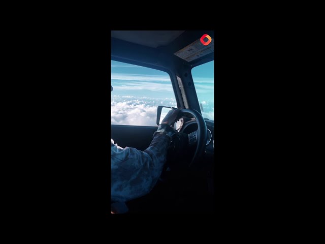 Optical illusion video that shows woman 'FLYING' her Jeep through the clouds goes viral